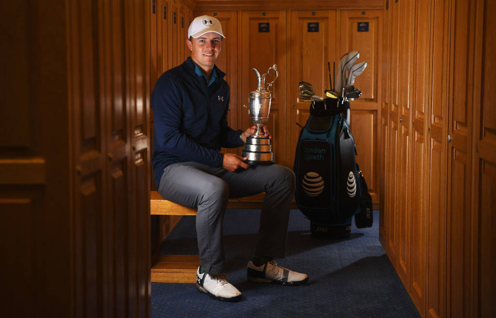 Jordan Spieth poses with the Claret Jug after winning The Open in 2017